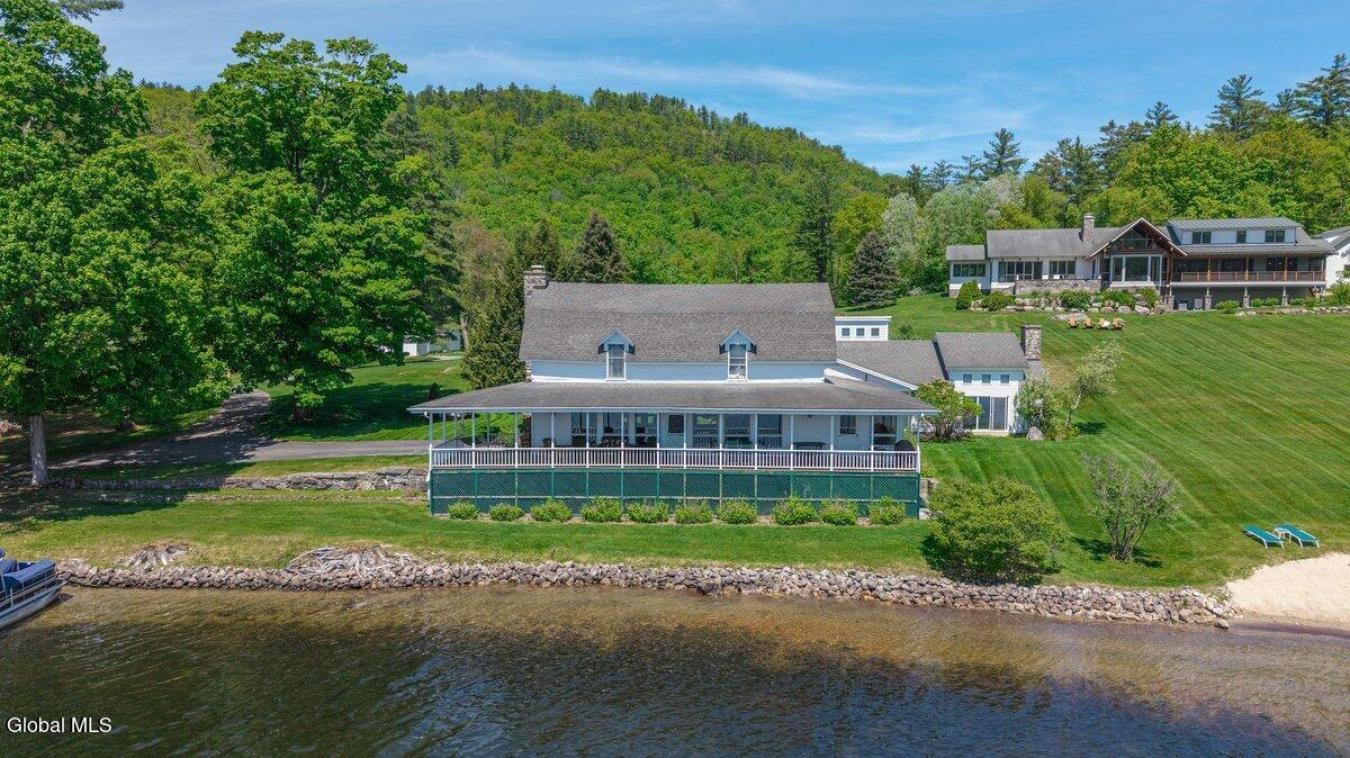 A historic Adirondack legacy, the Island House Estate offers a rare, c – image 10