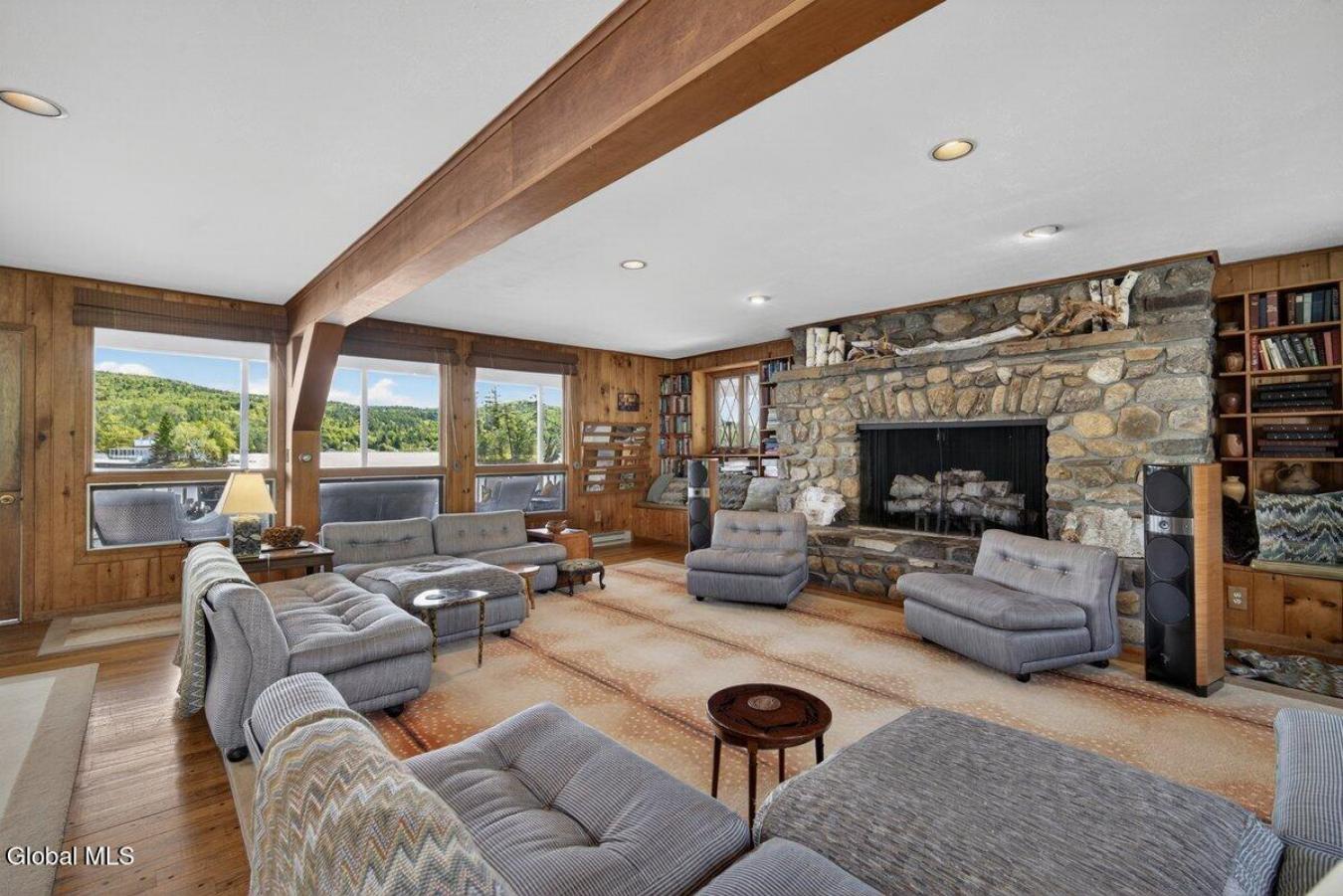A historic Adirondack legacy, the Island House Estate offers a rare, c – image 11