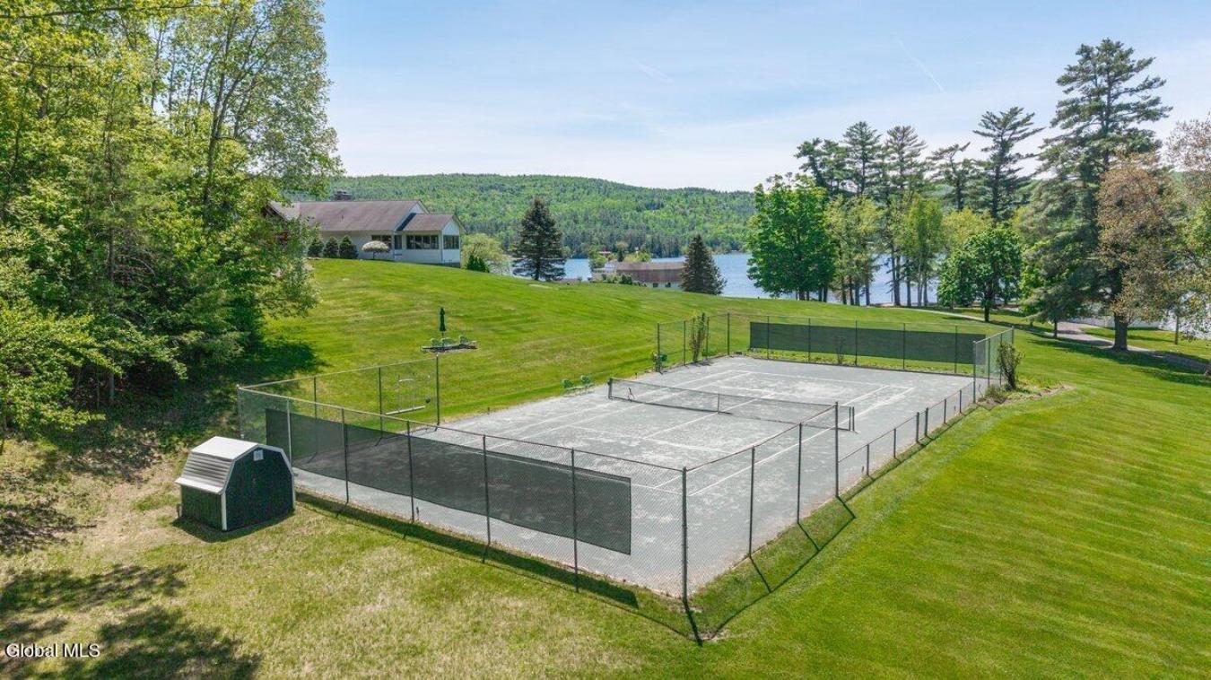 A historic Adirondack legacy, the Island House Estate offers a rare, c – image 13