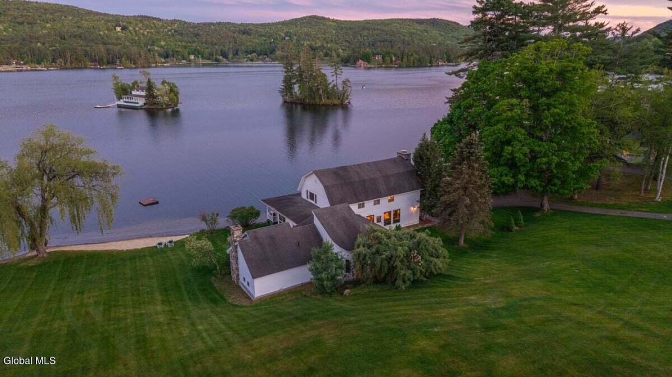 A historic Adirondack legacy, the Island House Estate offers a rare, c – image 17