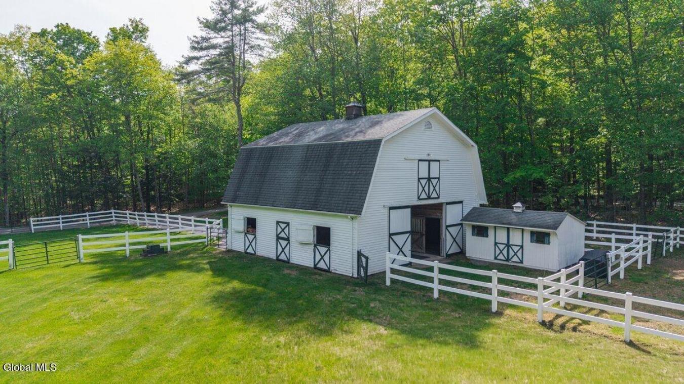 A historic Adirondack legacy, the Island House Estate offers a rare, c – image 18