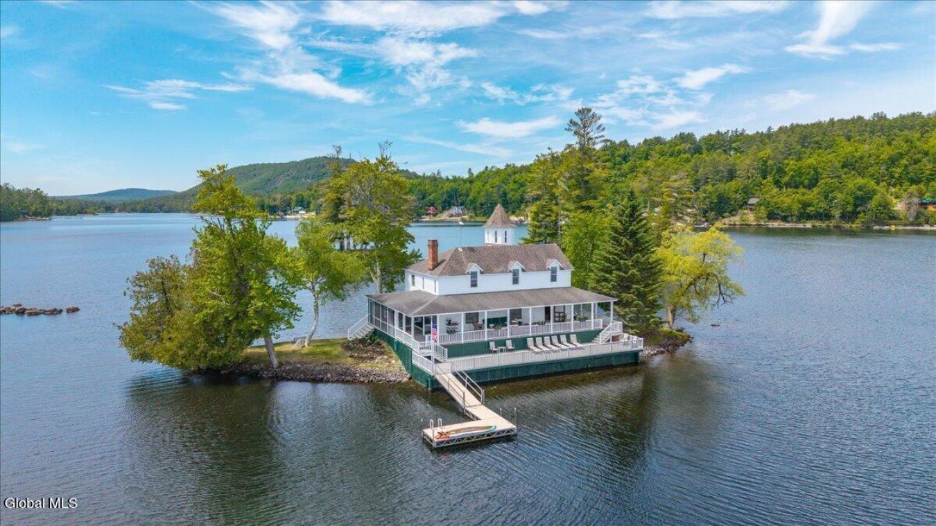 A historic Adirondack legacy, the Island House Estate offers a rare, c – image 19