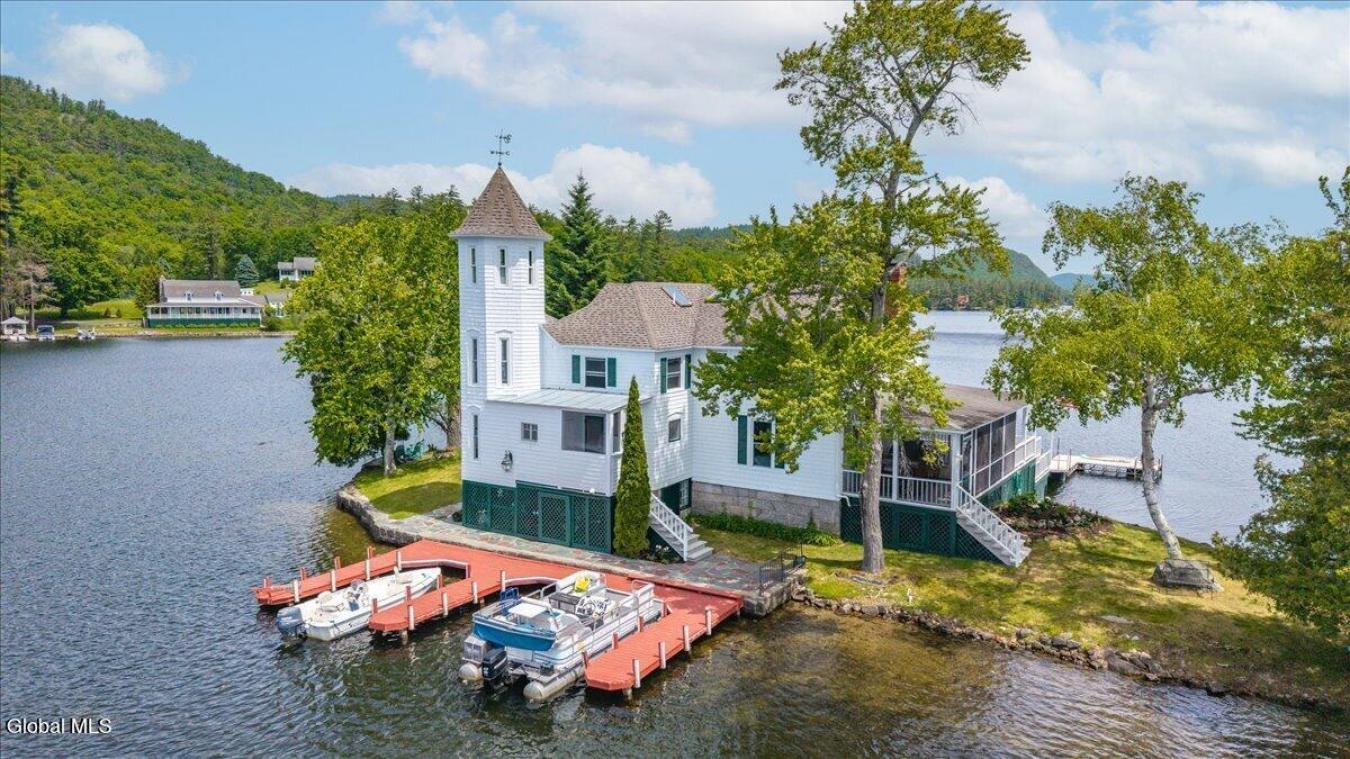A historic Adirondack legacy, the Island House Estate offers a rare, c – image 20