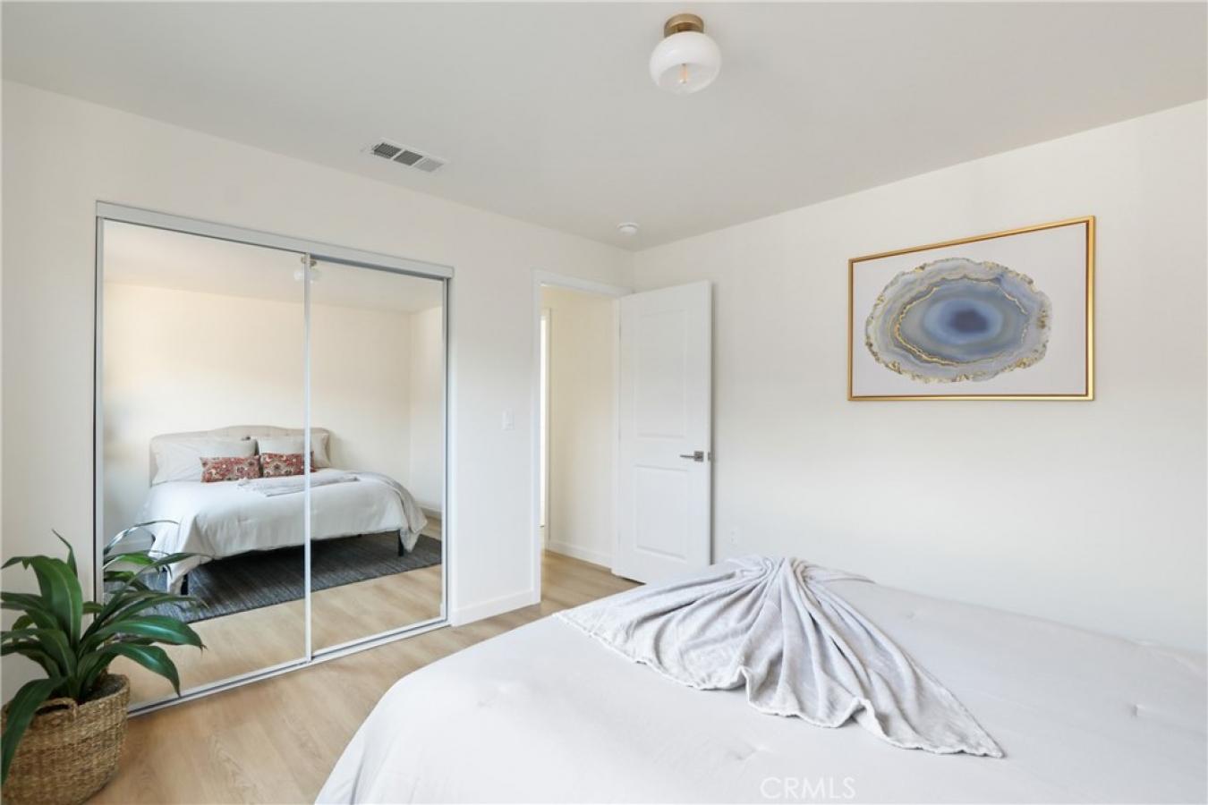 Welcome to 1614 W. 214th Street, a beautifully reimagined four-bedroom – image 12