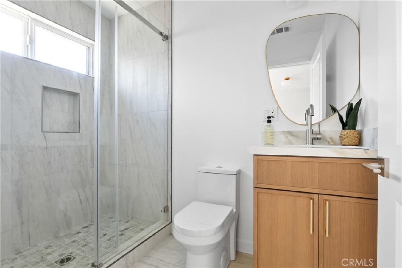 Welcome to 1614 W. 214th Street, a beautifully reimagined four-bedroom – image 14
