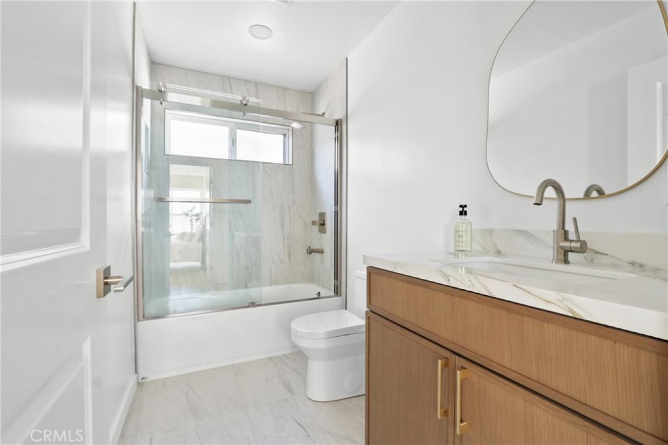 Welcome to 1614 W. 214th Street, a beautifully reimagined four-bedroom – image 19