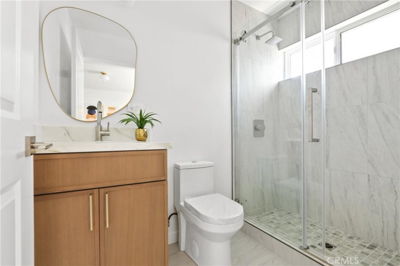 Welcome to 1614 W. 214th Street, a beautifully reimagined four-bedroom – image 20