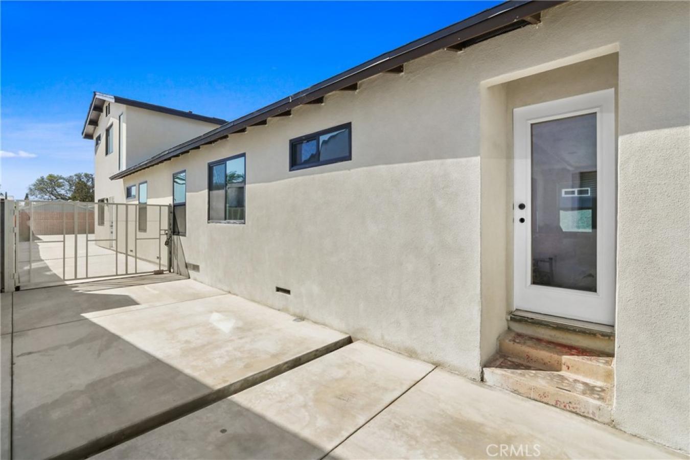 Welcome to 1614 W. 214th Street, a beautifully reimagined four-bedroom – image 3
