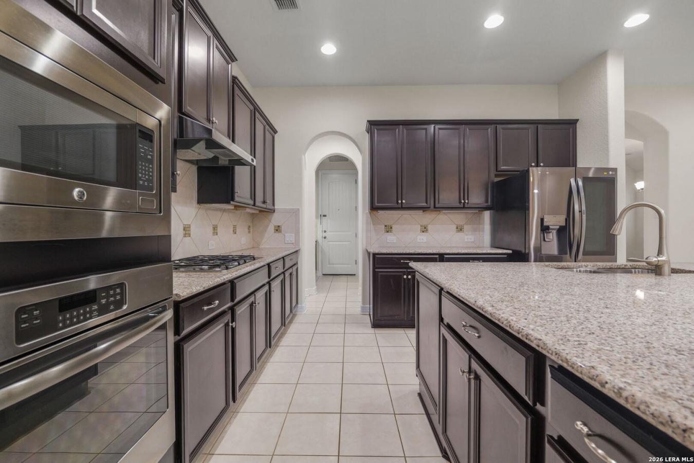 Located in the highly desired gated community of Westwinds Lone Star i – image 9