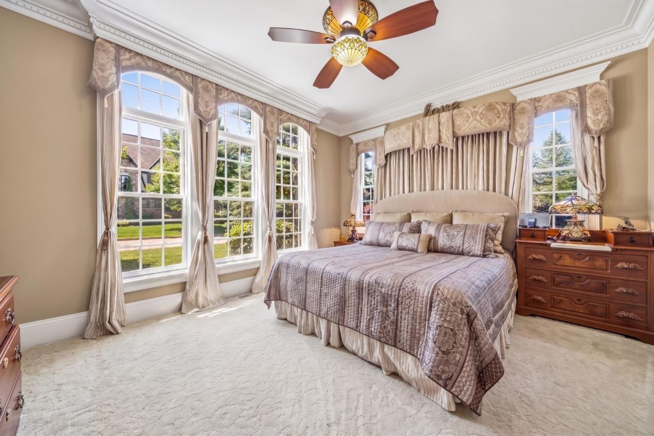 Across from Kirtland Country Club, this custom-curated residence bring – image 13