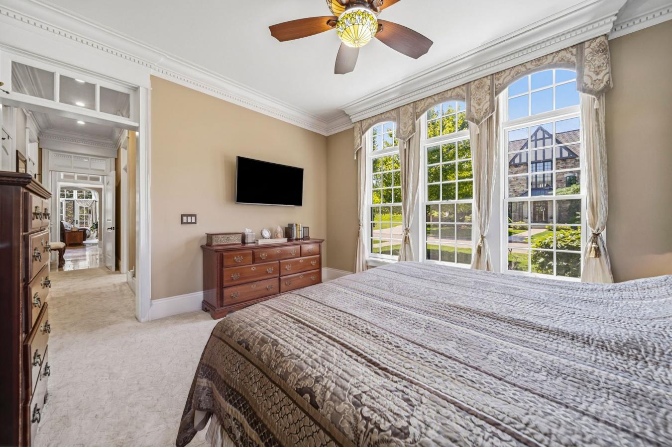 Across from Kirtland Country Club, this custom-curated residence bring – image 14