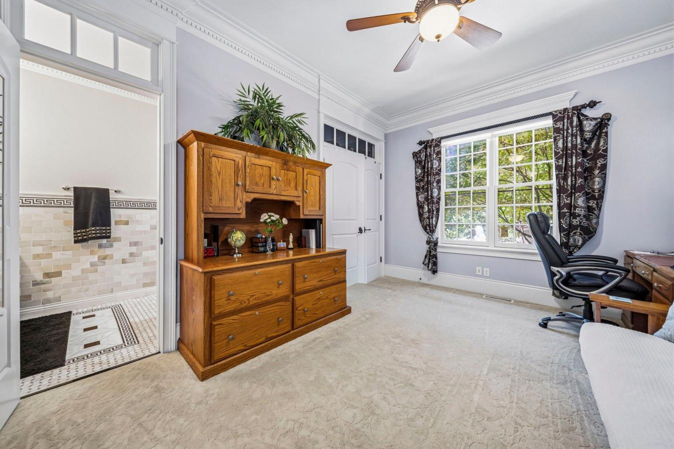 Across from Kirtland Country Club, this custom-curated residence bring – image 17