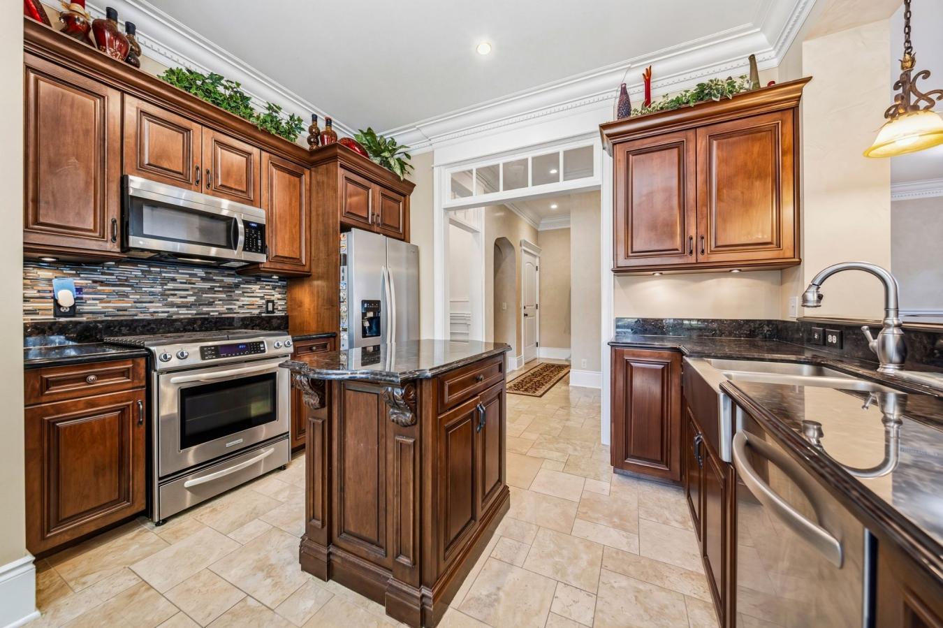 Across from Kirtland Country Club, this custom-curated residence bring – image 5