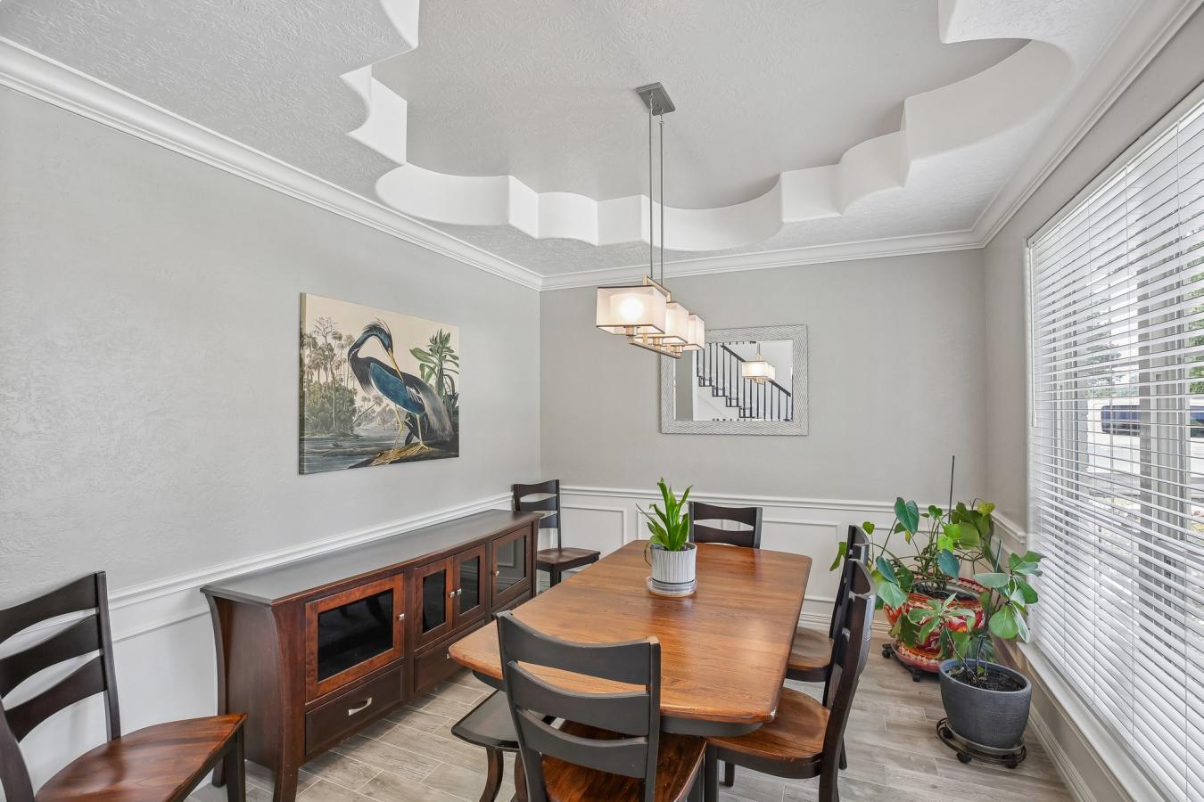 Situated on a secluded, beautifully wooded one-acre estate within the – image 7