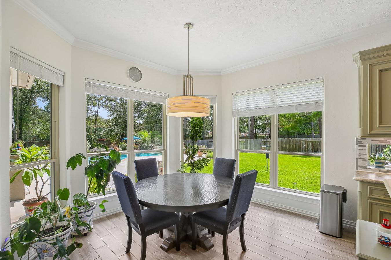Situated on a secluded, beautifully wooded one-acre estate within the – image 8