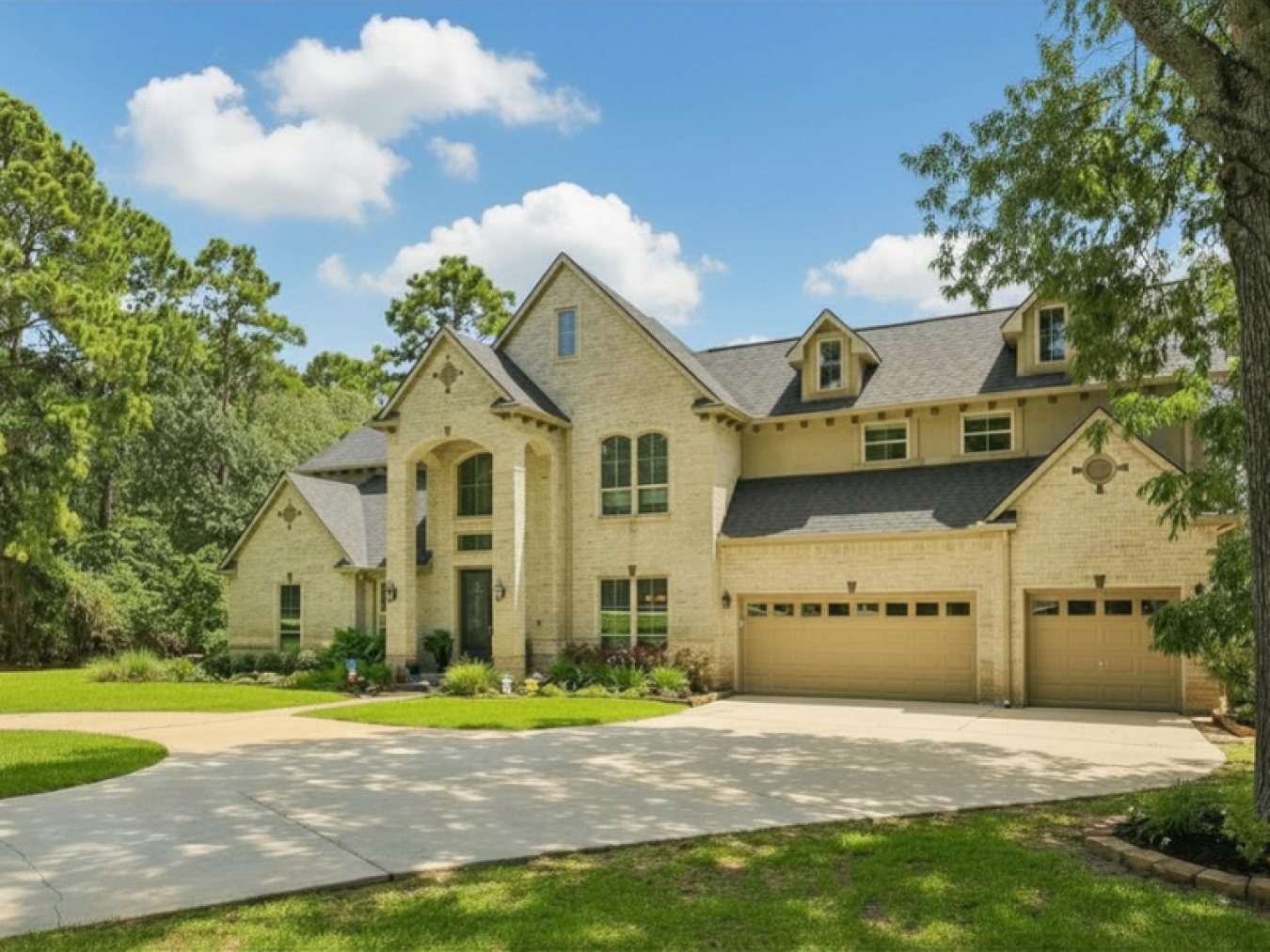 Situated on a secluded, beautifully wooded one-acre estate within the – image 2