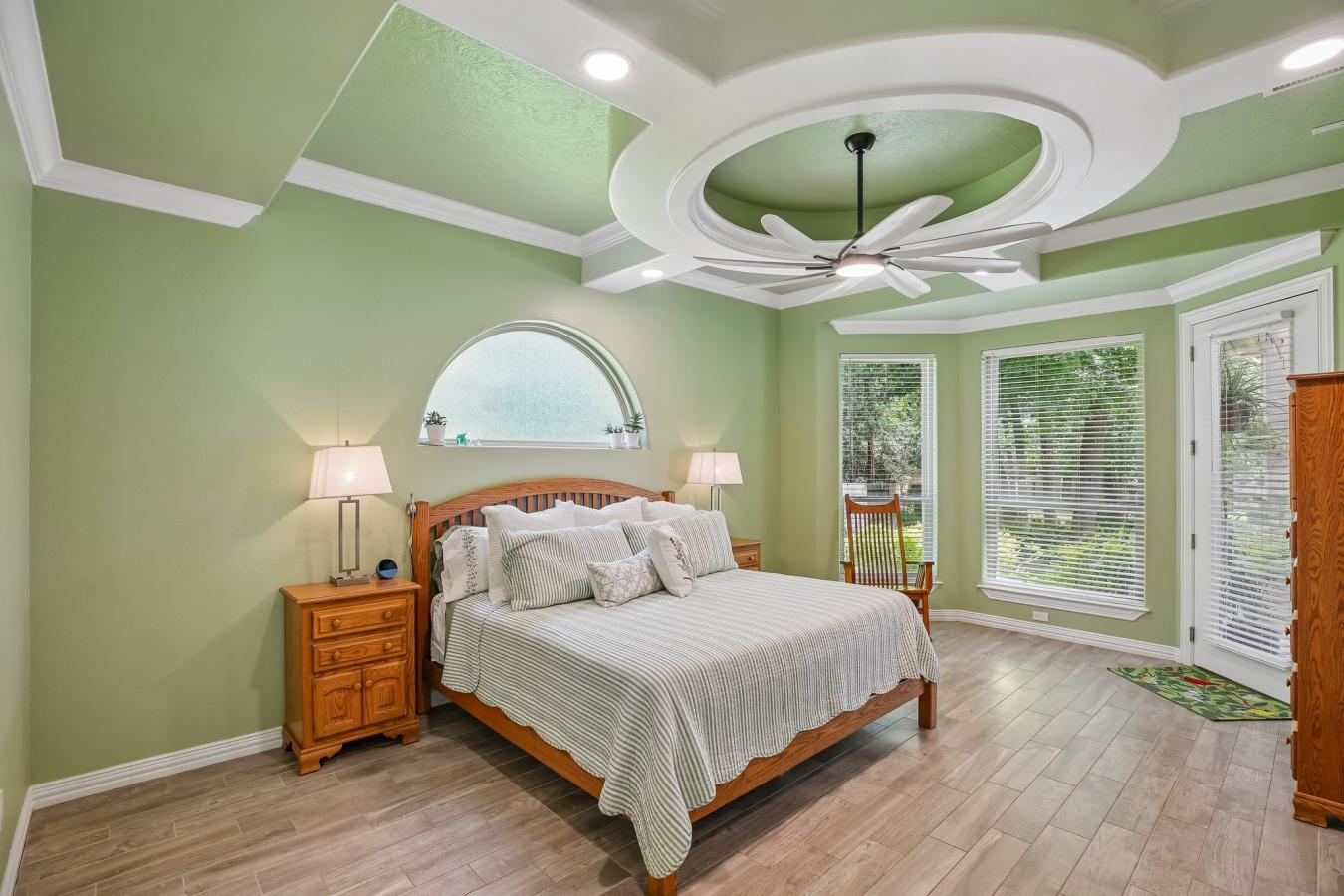 Situated on a secluded, beautifully wooded one-acre estate within the – image 11