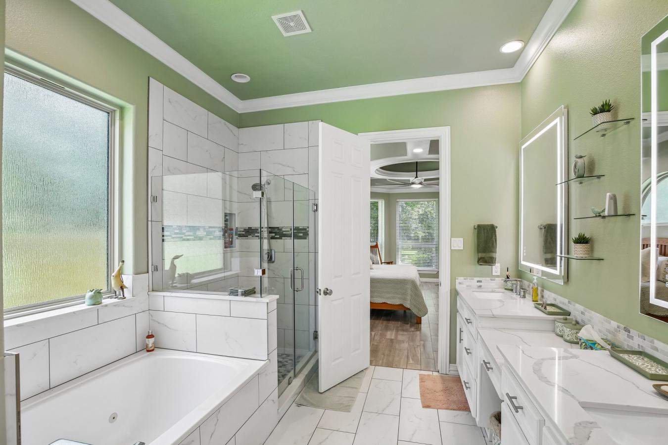 Situated on a secluded, beautifully wooded one-acre estate within the – image 13