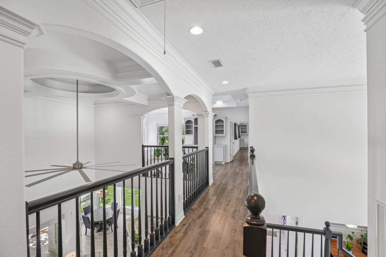 Situated on a secluded, beautifully wooded one-acre estate within the – image 15