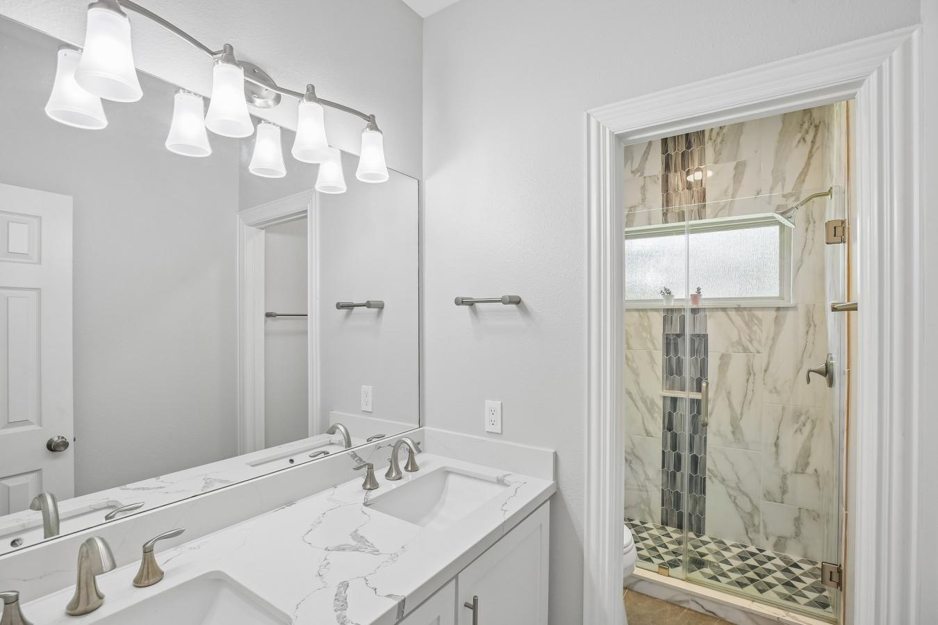 Situated on a secluded, beautifully wooded one-acre estate within the – image 19
