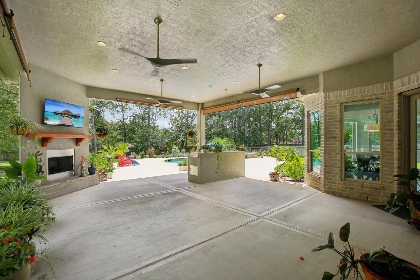 Situated on a secluded, beautifully wooded one-acre estate within the – image 20