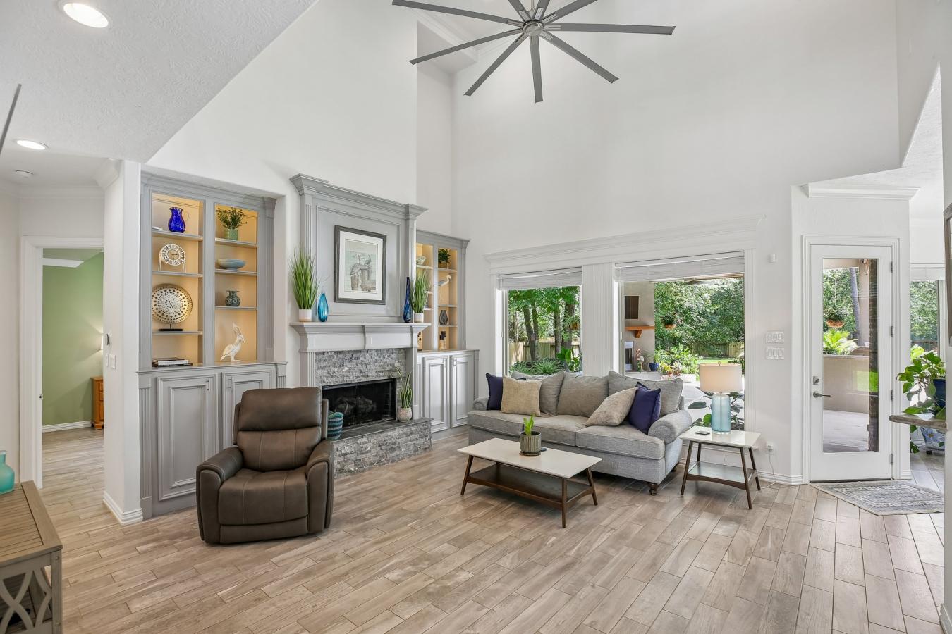 Situated on a secluded, beautifully wooded one-acre estate within the – image 5