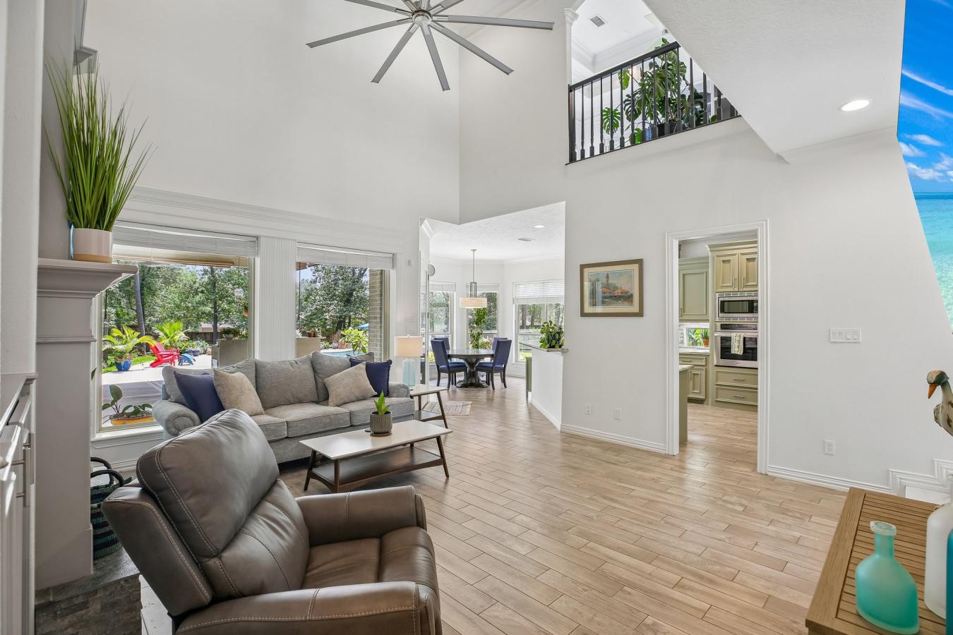 Situated on a secluded, beautifully wooded one-acre estate within the – image 4