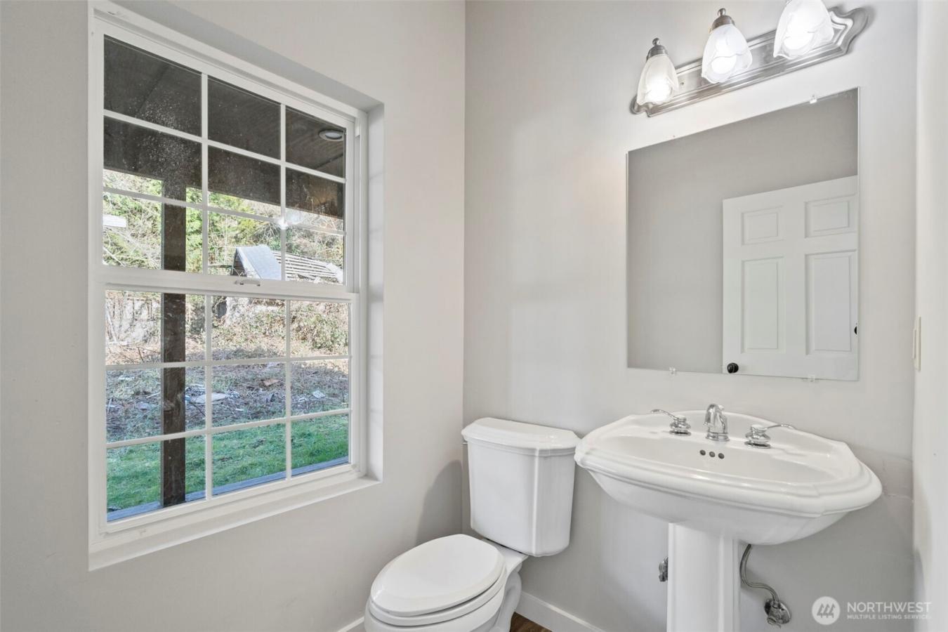 Majestic Colonial-style home on five secluded acres, an updated countr – image 17