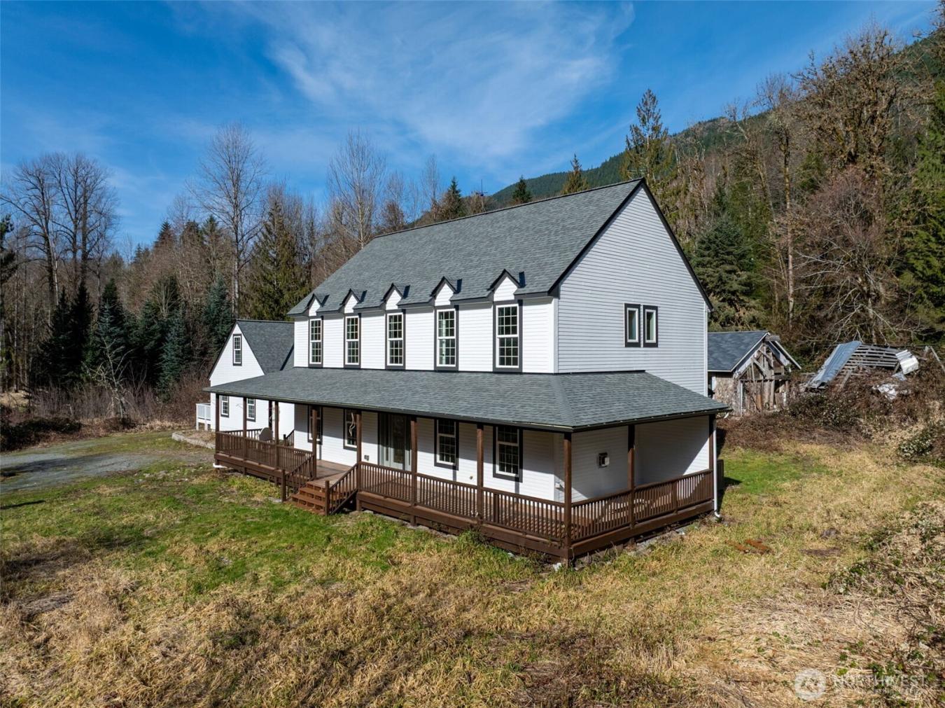 Majestic Colonial-style home on five secluded acres, an updated countr – image 4