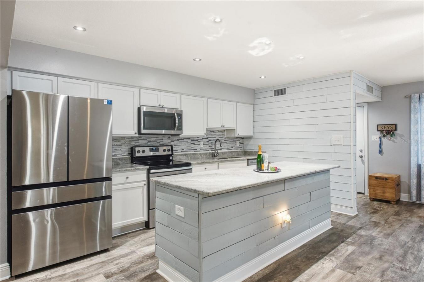 Welcome to 1144 Woodbrook Drive, a beautifully renovated 3-bedroom, 2- – image 9