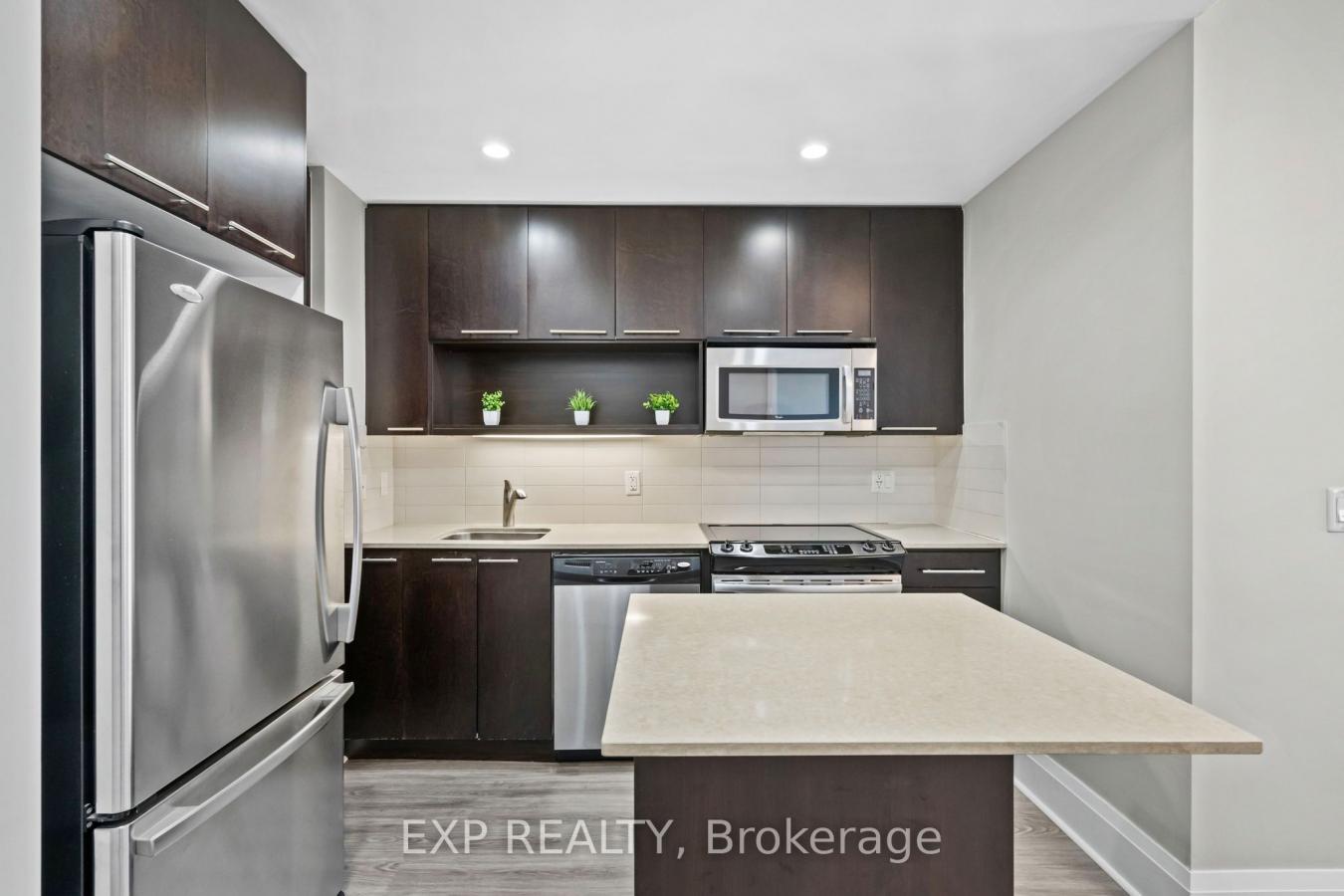 100 Harrison Garden Boulevard, Unit 1702. The Avonshire. A bright 887 – image 4