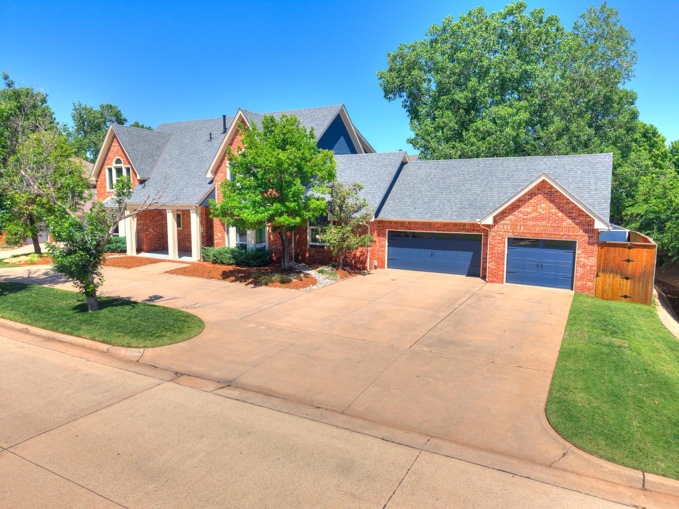 Nestled in the sought-after Blue Stem Lake Addition, this stunning cus – image 12