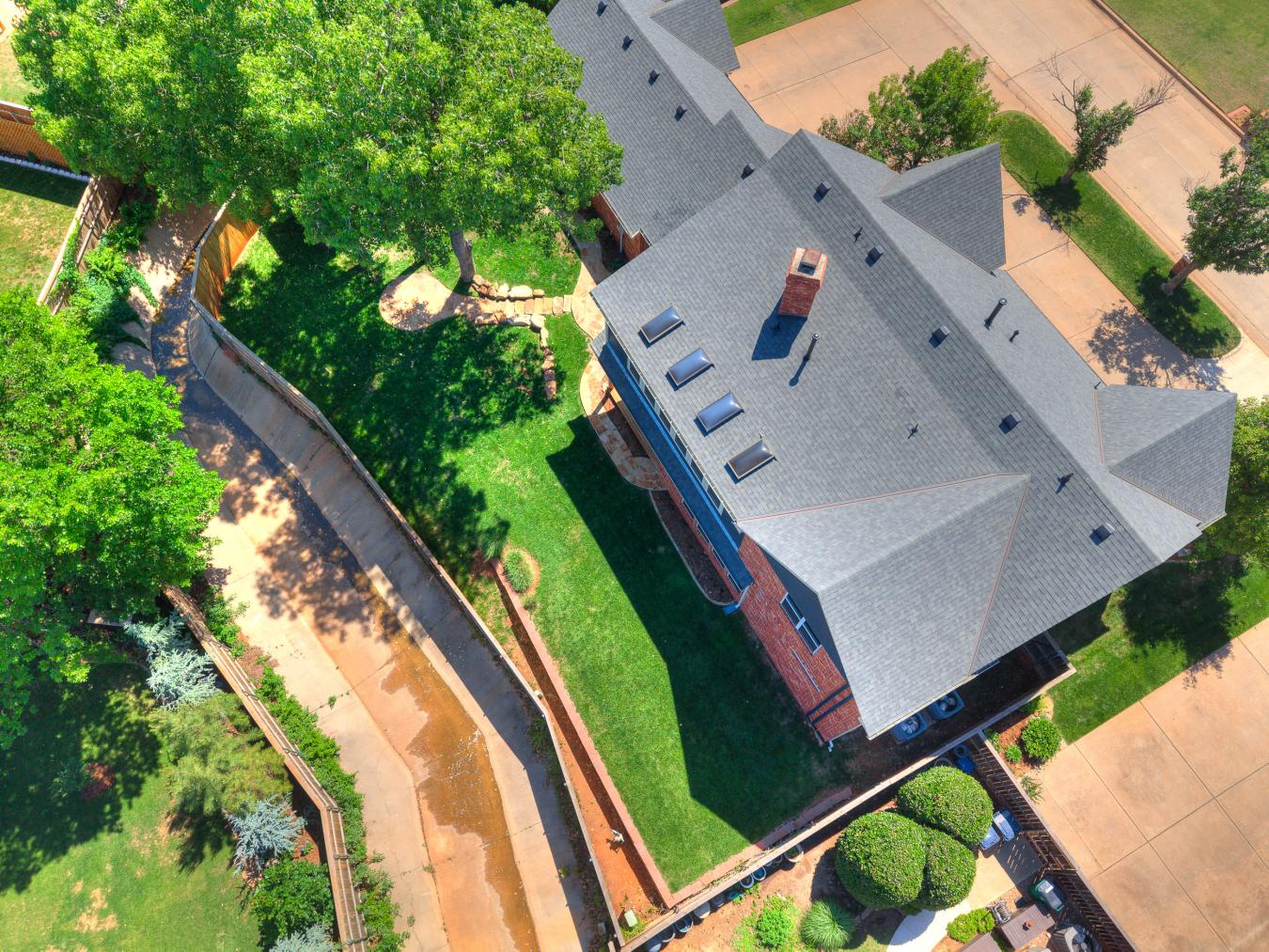 Nestled in the sought-after Blue Stem Lake Addition, this stunning cus – image 13