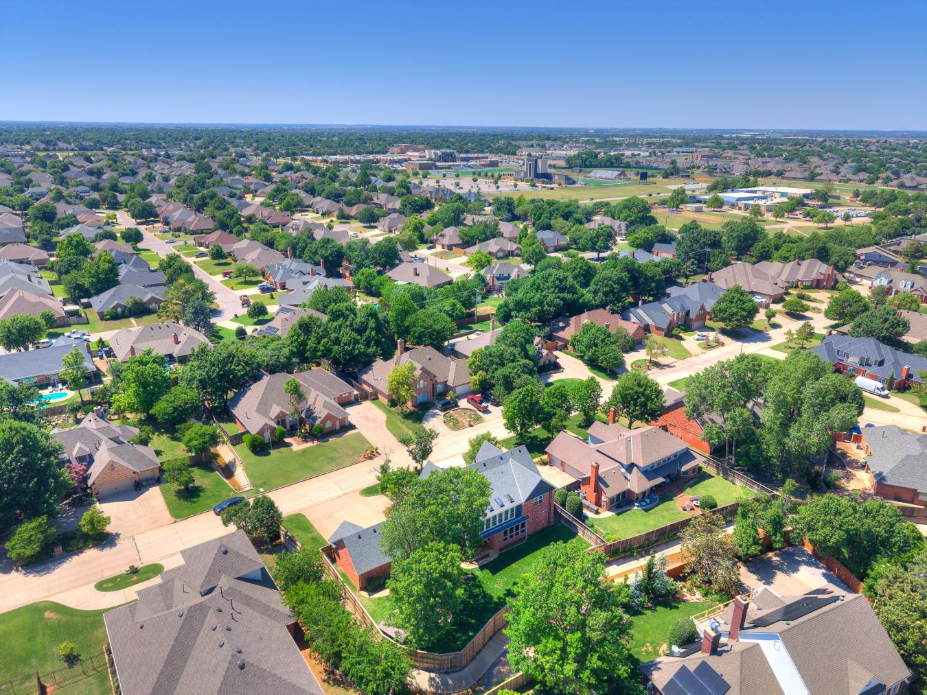 Nestled in the sought-after Blue Stem Lake Addition, this stunning cus – image 14