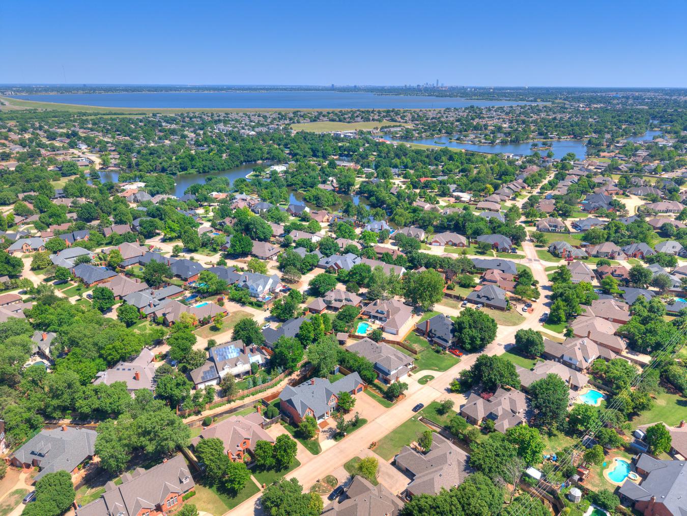 Nestled in the sought-after Blue Stem Lake Addition, this stunning cus – image 15
