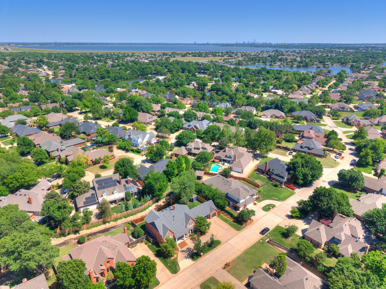 Nestled in the sought-after Blue Stem Lake Addition, this stunning cus – image 16