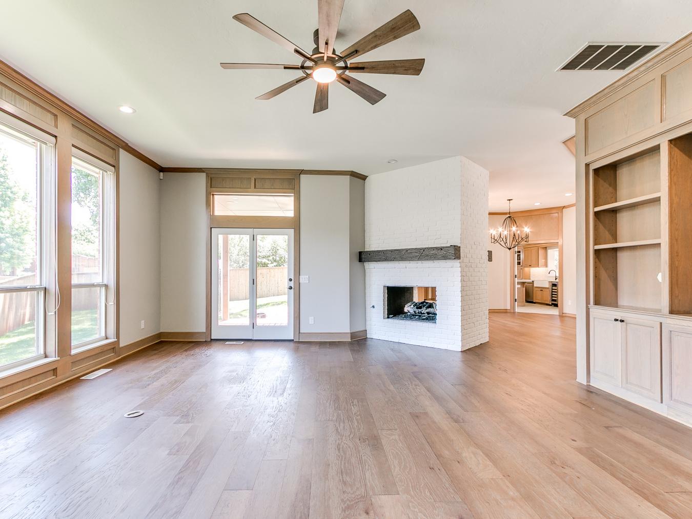 Nestled in the sought-after Blue Stem Lake Addition, this stunning cus – image 20