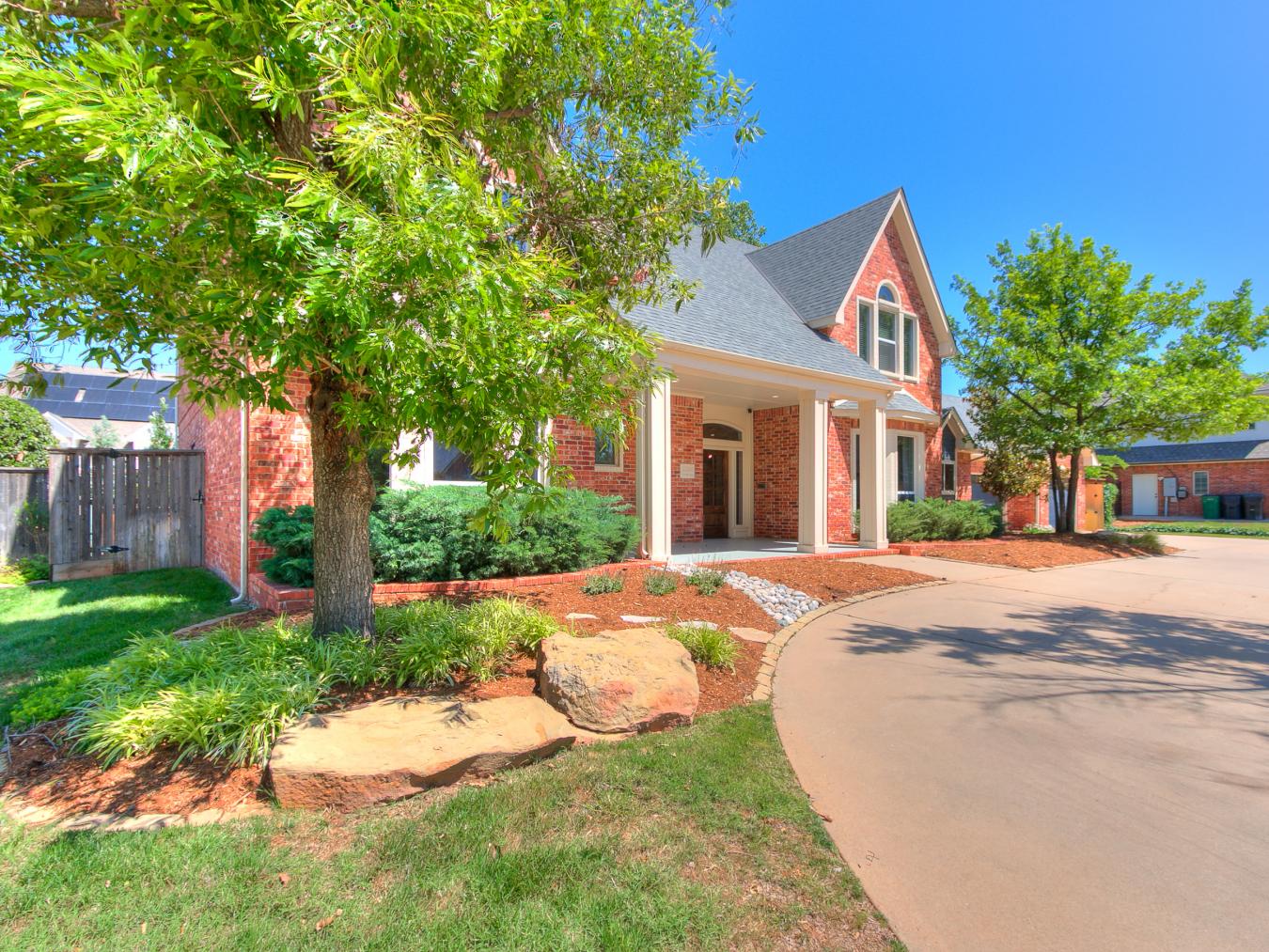 Nestled in the sought-after Blue Stem Lake Addition, this stunning cus – image 3