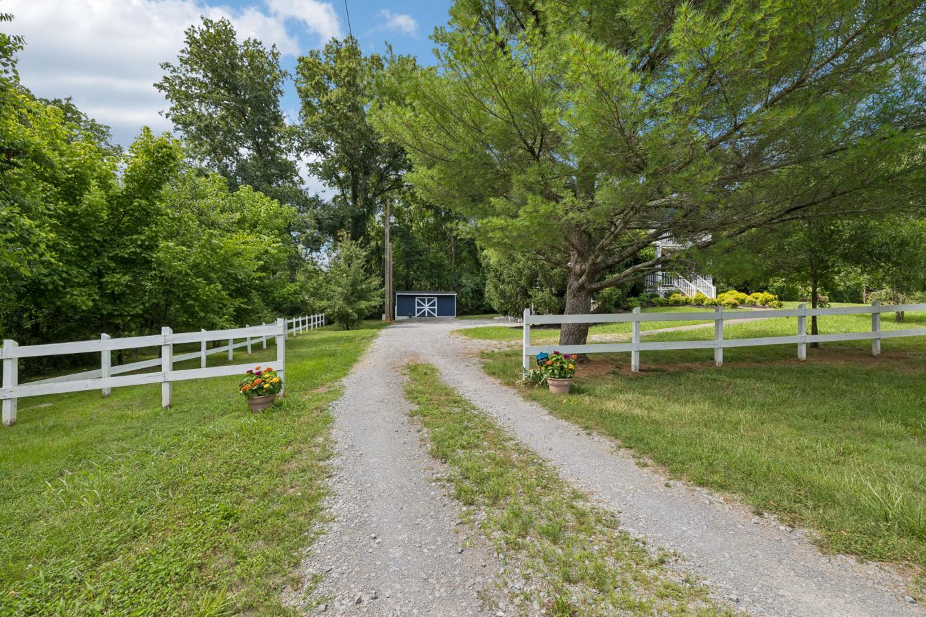 Private. Creative. Convenient. Bordering MTSU on a serene 0.68-acre lo – image 2