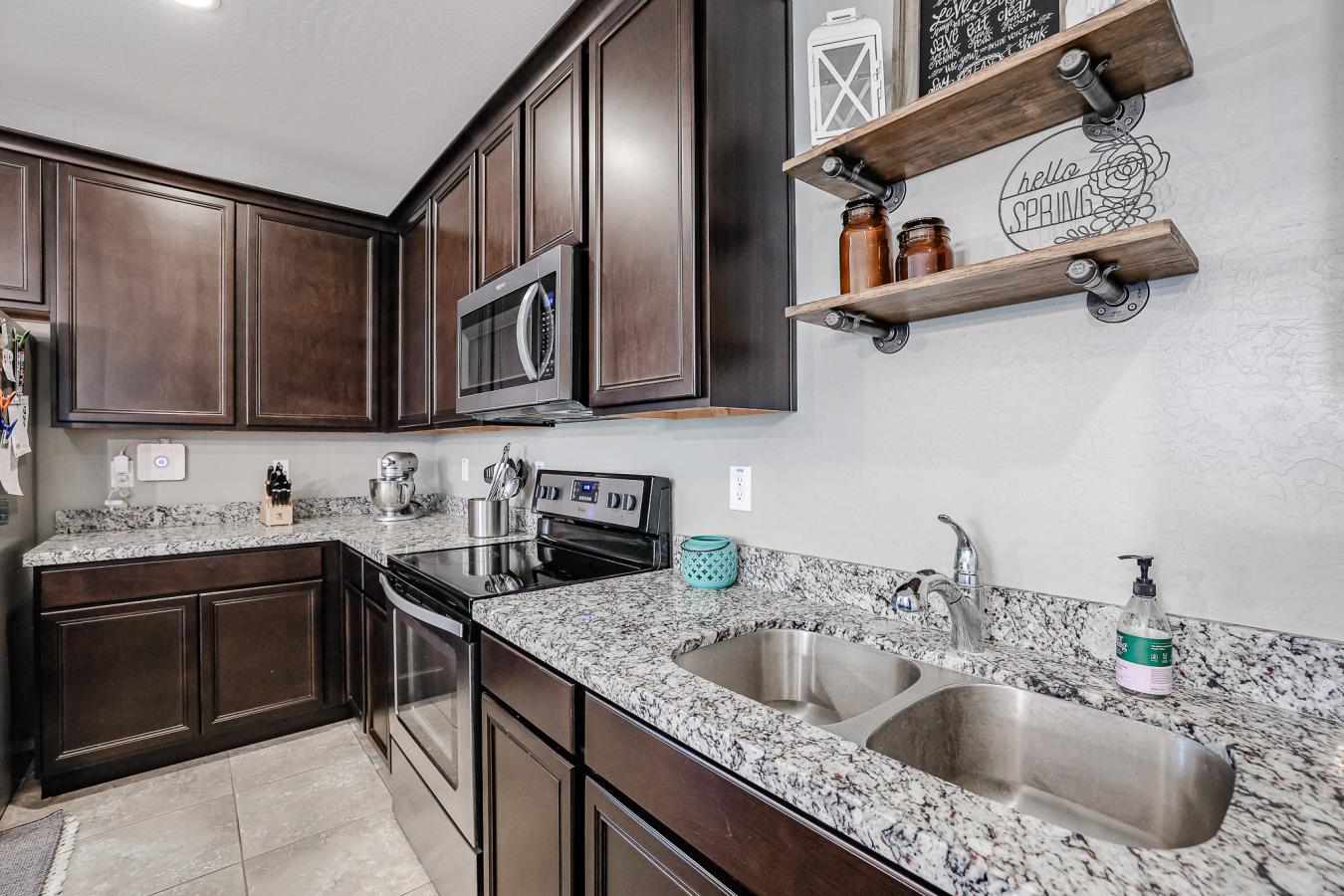 Discover your dream home! This 3 bed, 2 bath gem is located in a gated – image 8